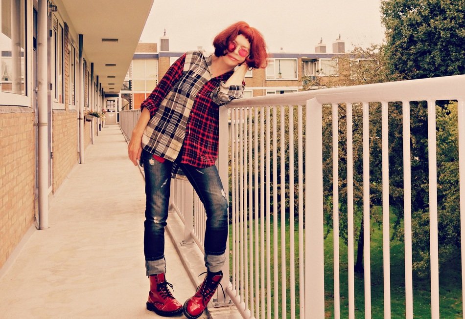 Woman model standing on a terrace