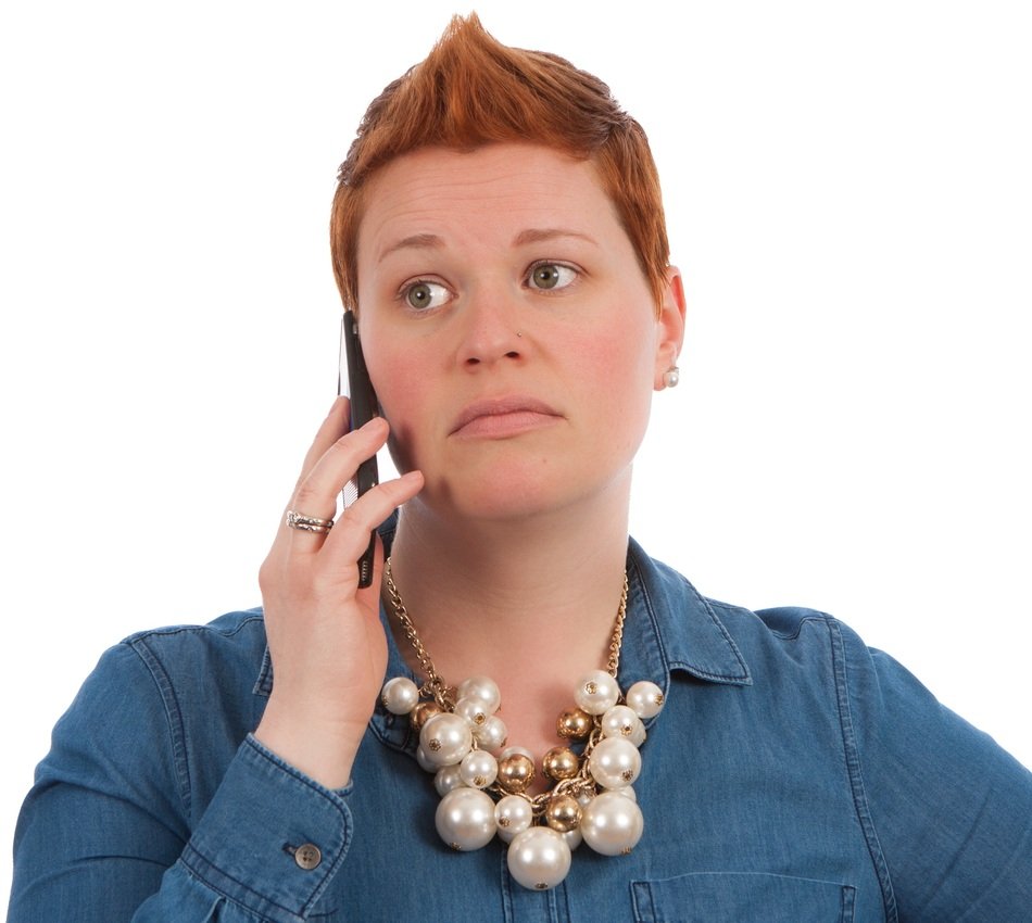 worried woman on phone