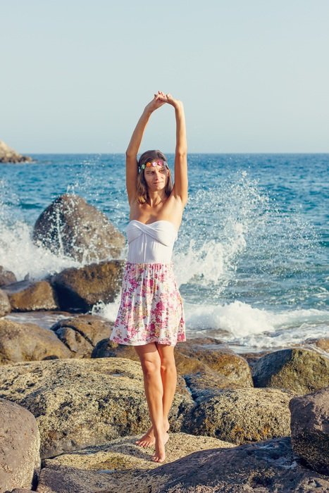girl in summer dress on the shores of the Canary Islands