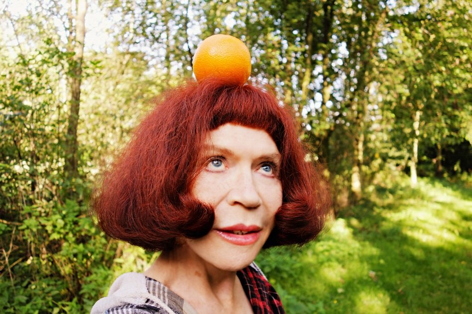 Portrait of woman with red head