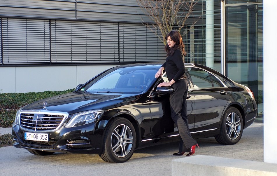 girl near the black car