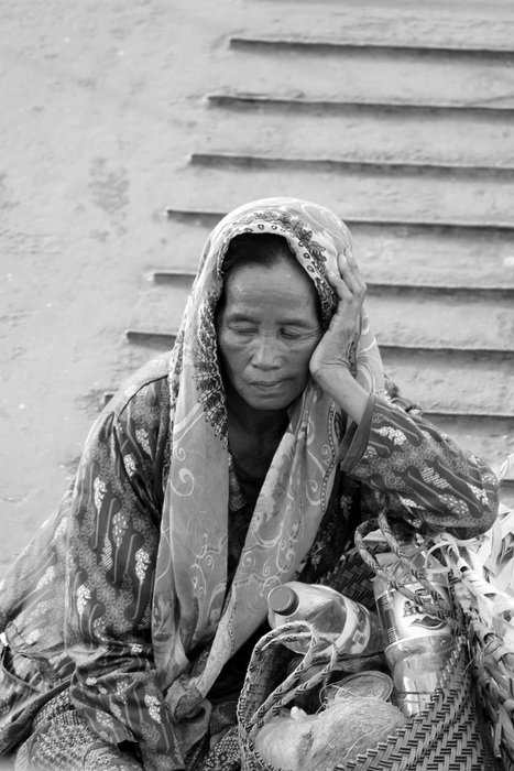 Black and white photo of the tired woman