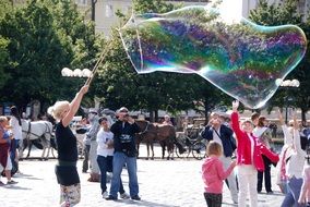 huge soap bubbles in the street