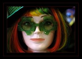 Woman with the colorful hair and glasses