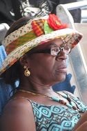 mature dark skin Woman in Exotic Hat