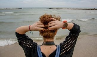 girl on the beach by the sea