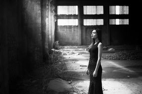 beautiful girl among the ruins in black and white image