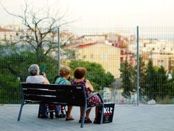 Old women sitting on a bench