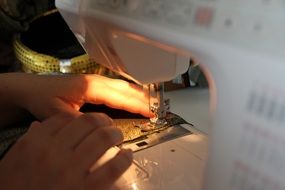 Sewing machine with light on the hands