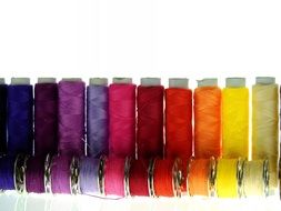 Colorful rainbow sewing threads