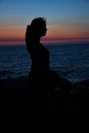 girl silhouette at sunset