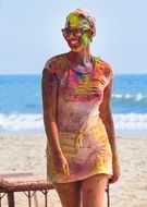 girl in bright colors on the beach