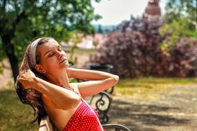 young woman in relaxation on a bench
