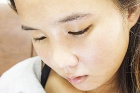 photo of a girl with narrow eyes