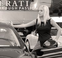 Black and white photo of Maserati auto show