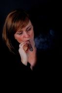 portrait of smoking woman a cigar