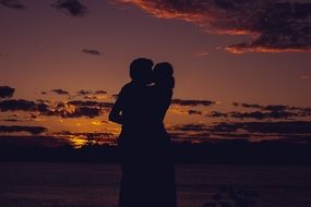 couple in love at a romantic sunset