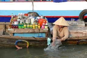 Man on the boat on Mekong river in Vietnam