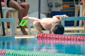 Young boy in a swimming pool