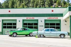 gas station with vintage classic cars