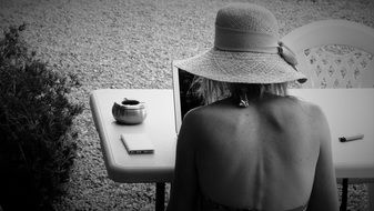 rear view woman with laptop