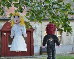 wedding dolls on a tree branch