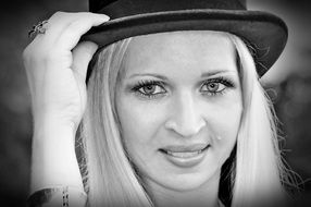 Black And White photo of woman in a hat