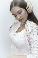 cute brunette in a white blouse