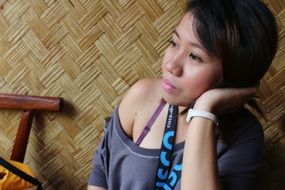 Portrait of asian young woman in thought
