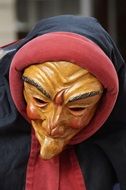 wooden mask of old woman