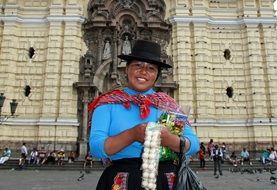 woman in a square in peru