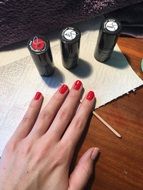 manicure with red polish