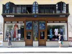 women at luxury Shophouse Windows