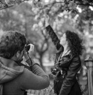 girl and photographer in black and white image