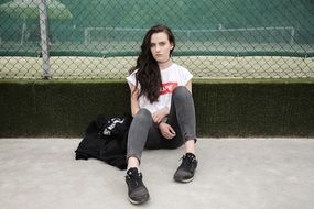 young woman in street clothes