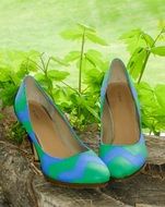 blue and green Shoes on high Heels outdoor