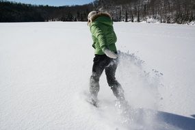 ice skating on the snow-covered lake