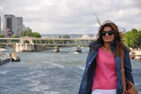 woman by the river in Paris