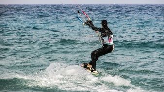 woman is engaged in water sports