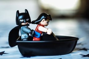 superhero figure with a girl