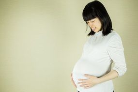 asian pregnant woman