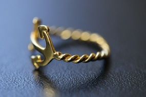 ring with an anchor on the table