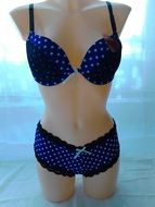 blue swimsuit with small polka dots