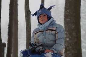 boy in winter park
