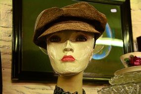 female mannequin in hat