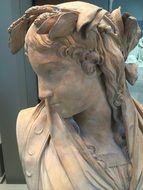 Young woman bust in louvre museum