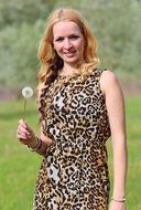 blonde girl with dandelion