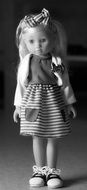 black and white photo of fashion doll