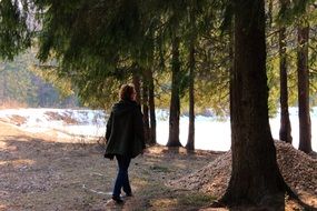 woman walking in the forest