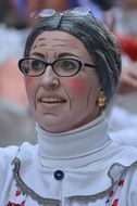 woman with face painting in carnival